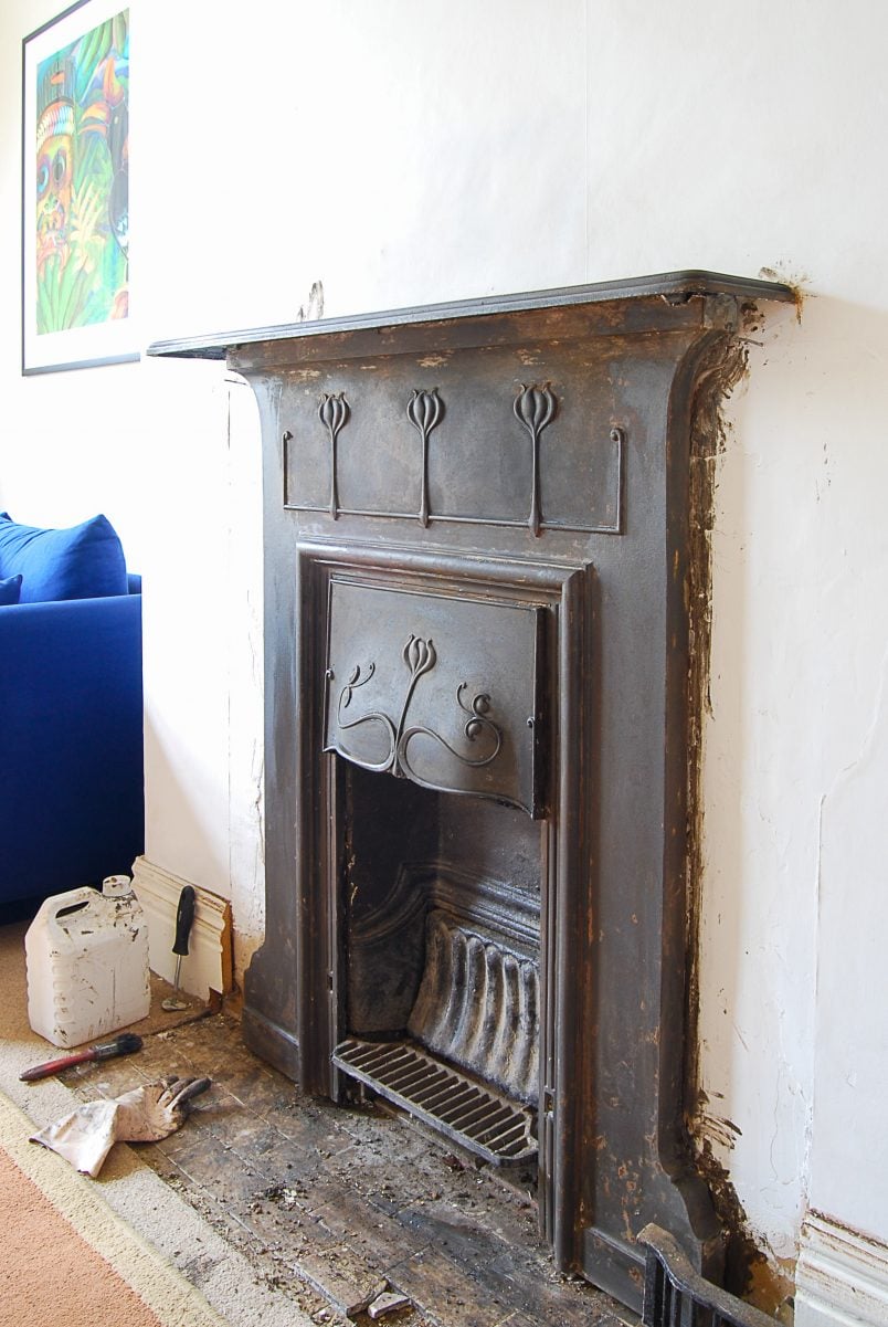 restoring a cast iron fireplace in progress