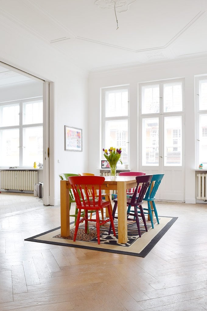 Dining Room with colourful chairs - Little House On The Corner