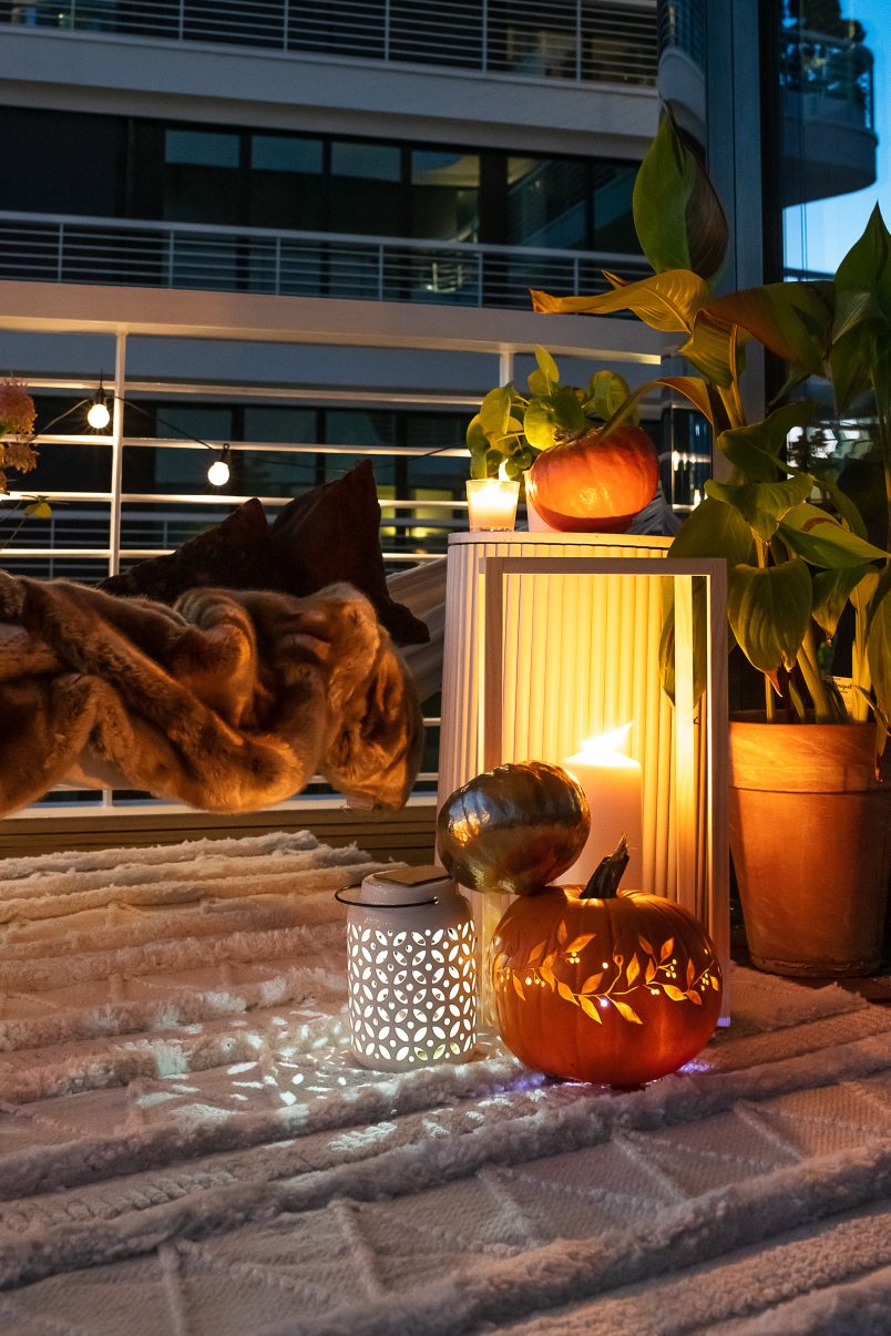 Autumn Balcony with Lantern and Pumpkins