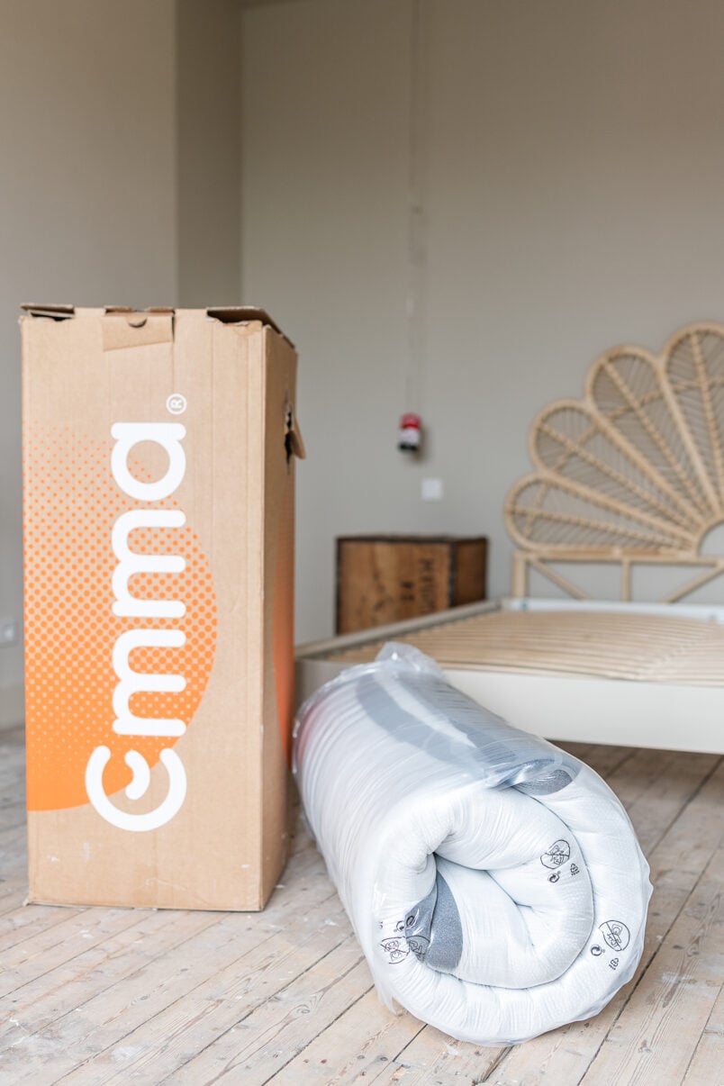 Unboxing emma mattres with box next to mattress