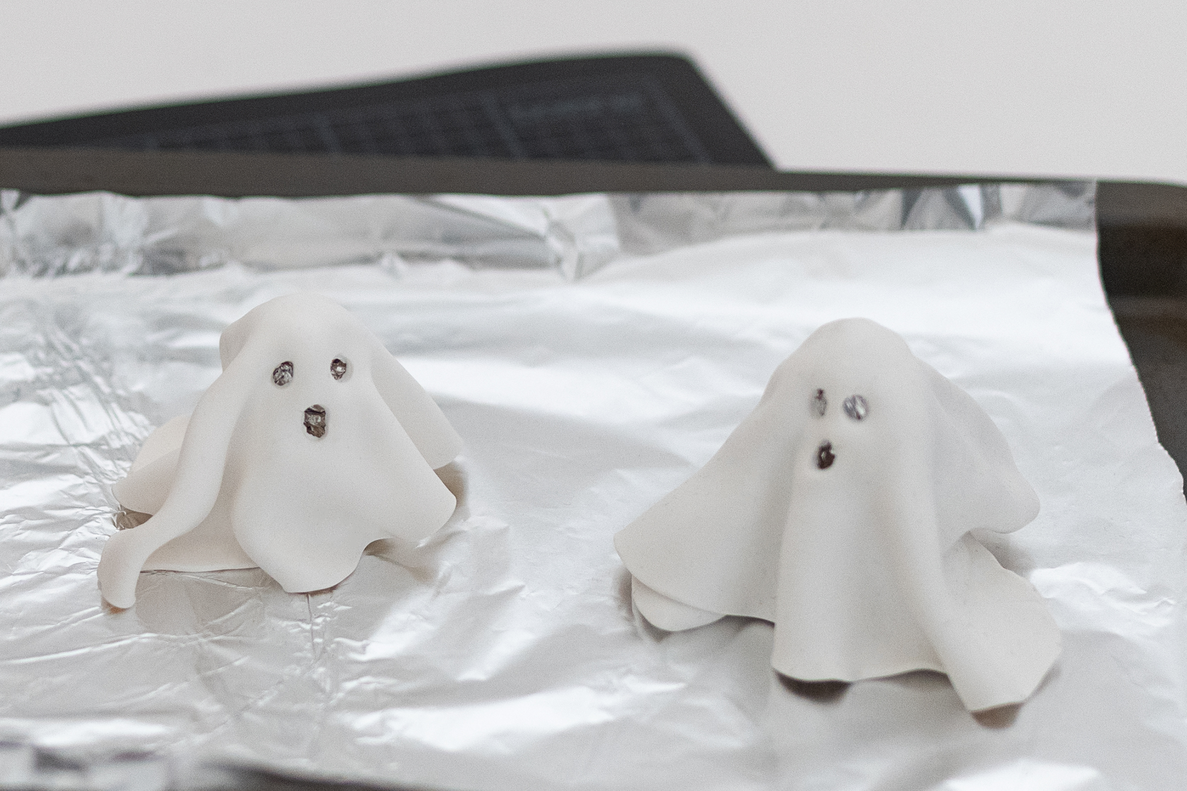 DIY clay halloween ghosts ready for baking