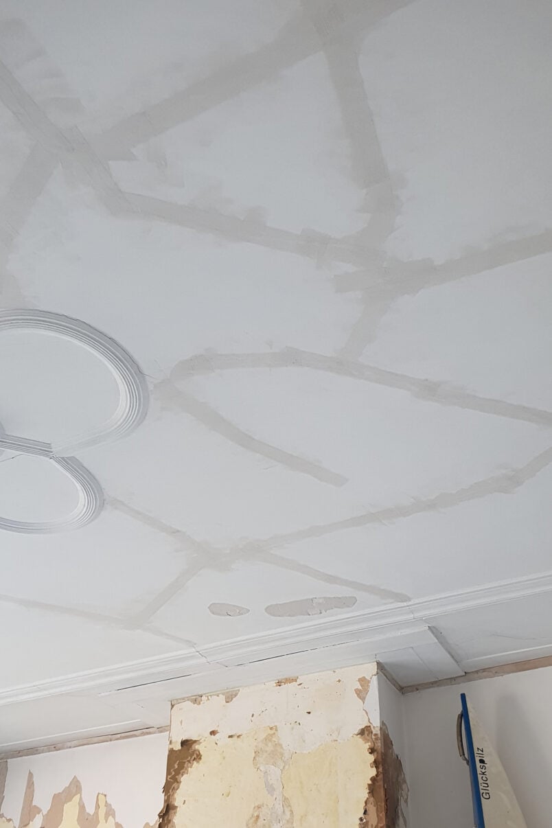 repaired cracks on plastered ceiling